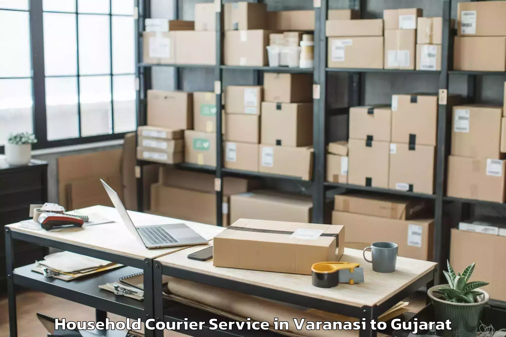 Professional Varanasi to Marwadi University Rajkot Household Courier